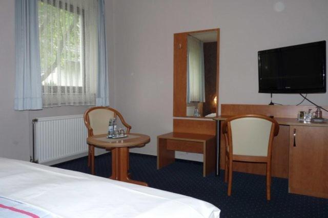 Hotel Garni Haus Schoenberger Heiligenhaus Habitación foto